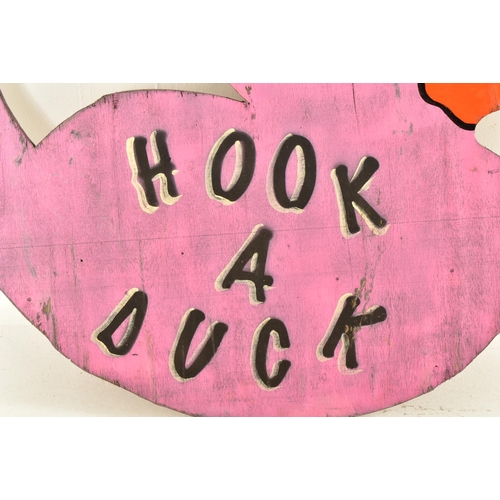 597 - Hook A Duck - A vintage 20th century fairground / funfair hand painted sign in the form of duck. The... 