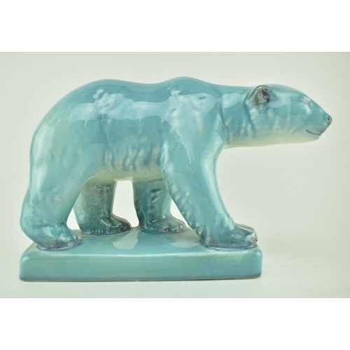 598 - Beswick - a mid 20th century ceramic porcelain figurine of a polar bear. The polar bear painted in b... 