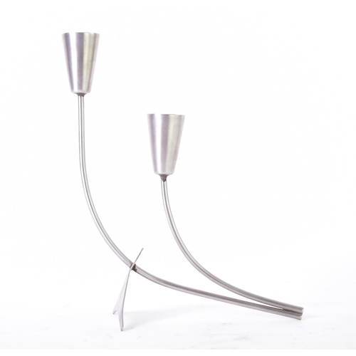 601 - Modernist Carnival Designs - A Danish vintage mid 20th century circa 1970s stainless steel candlesti... 