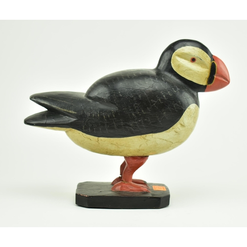 612 - A 20th century hand carved and painted wooden display in the form of a puffin. Carved wood with pain... 