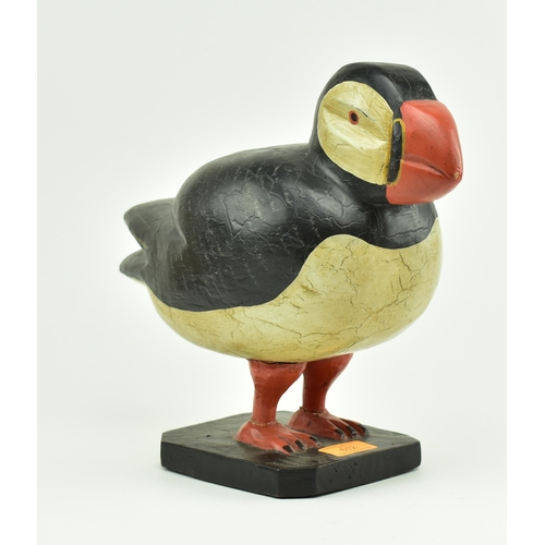 612 - A 20th century hand carved and painted wooden display in the form of a puffin. Carved wood with pain... 