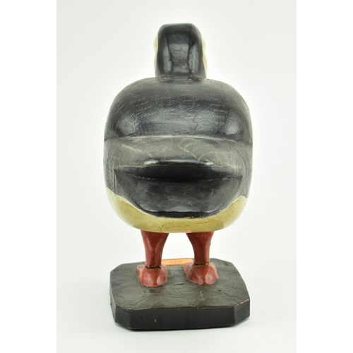 612 - A 20th century hand carved and painted wooden display in the form of a puffin. Carved wood with pain... 