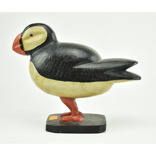 612 - A 20th century hand carved and painted wooden display in the form of a puffin. Carved wood with pain... 