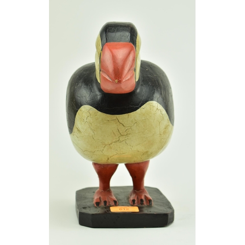 612 - A 20th century hand carved and painted wooden display in the form of a puffin. Carved wood with pain... 