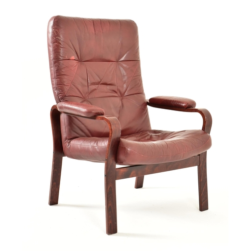 615 - A retro mid 20th century Scandinavian designed bentwood and leather armchair / lounge chair. The cha... 