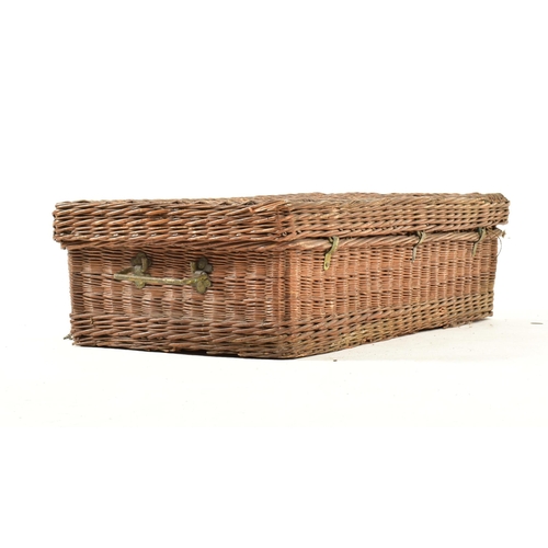 623 - An early 20th century circa 1920s six person Coracle wicker picnic basket. The basket opening to rev... 