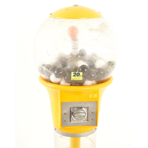 627 - Beaver Revolution - A late 20th century plastic gumball machine / dispenser. Large yellow and clear ... 