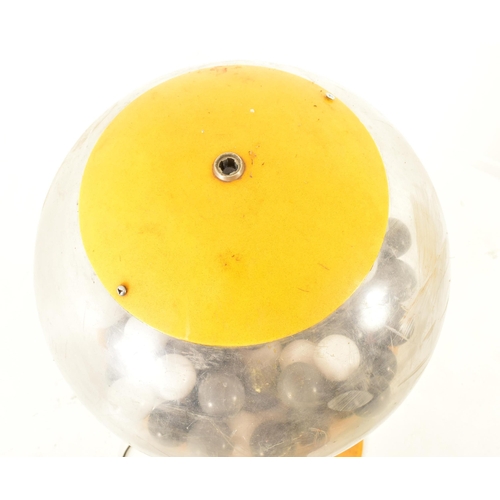 627 - Beaver Revolution - A late 20th century plastic gumball machine / dispenser. Large yellow and clear ... 