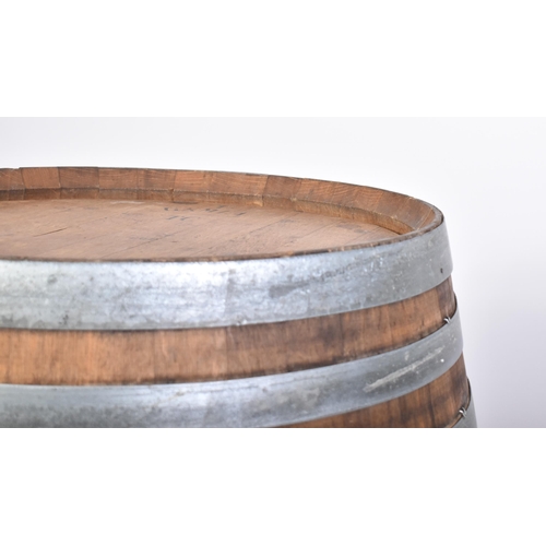 65 - A large vintage late 20th century iron bound wine barrel from ' Masseria Altemura ', Puglia, Italy. ... 