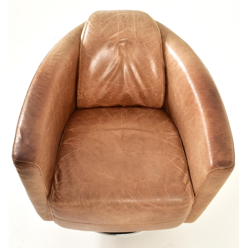 107 - Halo - A retro late 20th century brown leather Aviator style tub swivel chair. The armchair having a... 