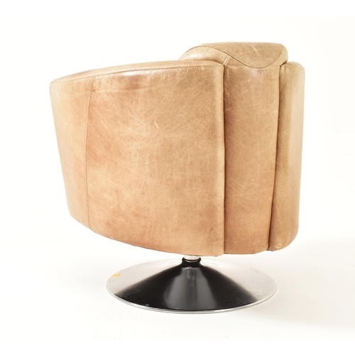 107 - Halo - A retro late 20th century brown leather Aviator style tub swivel chair. The armchair having a... 