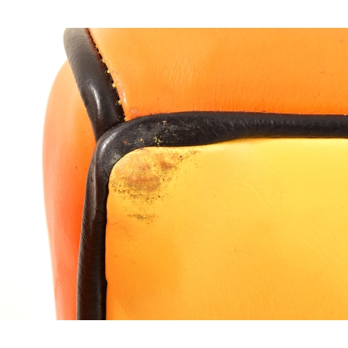 133 - A matching pair of contemporary designer armchairs. Each chair having a faux leather stitched uphols... 