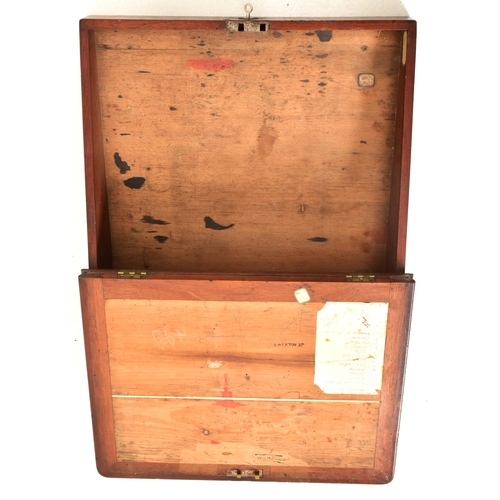 134 - A Victorian 19th century walnut & leather clerk's monk's desk. The desk top having a straight inkwel... 