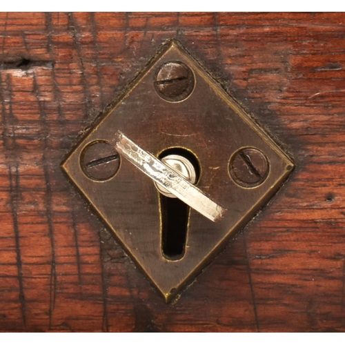 134 - A Victorian 19th century walnut & leather clerk's monk's desk. The desk top having a straight inkwel... 