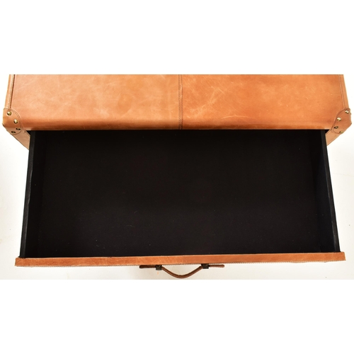 165 - In the manner of Mufti Designs - A vintage late 20th century tan leather console hall table. The tab... 