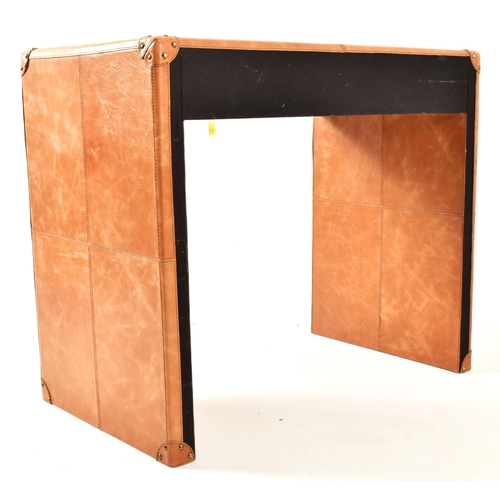 165 - In the manner of Mufti Designs - A vintage late 20th century tan leather console hall table. The tab... 