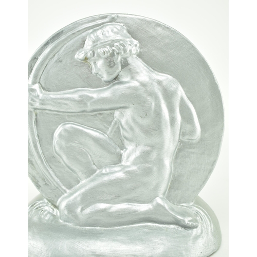 294 - A mid 20th century Art Deco style plaster mantlepiece scene of an athlete holding a bow. The piece d... 