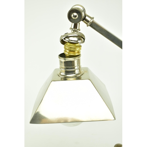 514 - A 20th century heavy chrome anglepoise counter balance table lamp - light. Square terraced base with... 