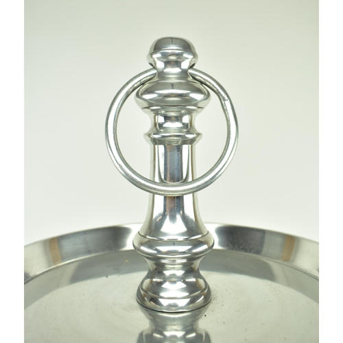 614 - A contemporary large three tier cake stand / food display stand. Central polished metal turned steam... 