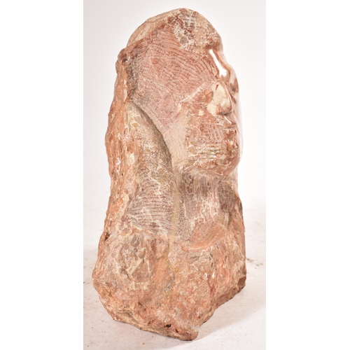 646 - A contemporary hand chiselled & polished pink marble conceptual floor sculpture statue. The sculptur... 