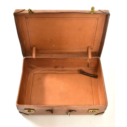 71 - A pair of vintage late 20th century pig skin leather travelling suitcases. Each suitcase of rectangu... 