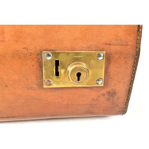 71 - A pair of vintage late 20th century pig skin leather travelling suitcases. Each suitcase of rectangu... 