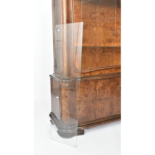 307 - A large  20th century 1930s continental Art Deco walnut veneer bookcase cabinet. The cabinet top hav... 