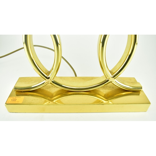 122 - A 1970s French tubular brass table lamp in the manner of Jacques Adnet. Brass plinth base of rectang... 