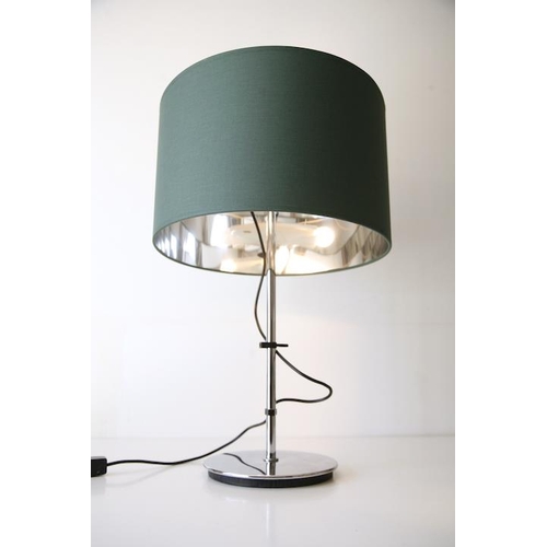 259 - A vintage 20th century German table / desk lamp light. The lamp having a green barrel shade with thr... 