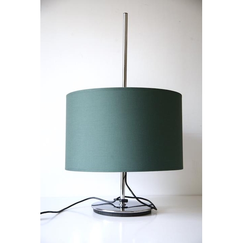 259 - A vintage 20th century German table / desk lamp light. The lamp having a green barrel shade with thr... 