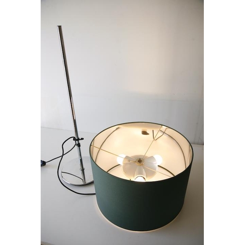 259 - A vintage 20th century German table / desk lamp light. The lamp having a green barrel shade with thr... 