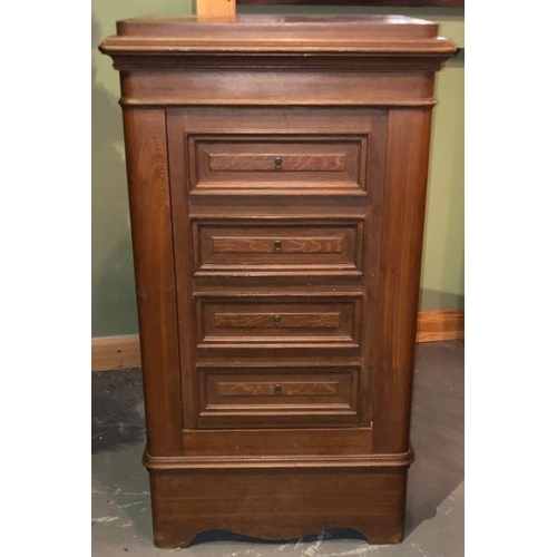 215 - A 20th century solid cast iron bachelor chest of drawers shaped floor safe. The safe in the shape of... 