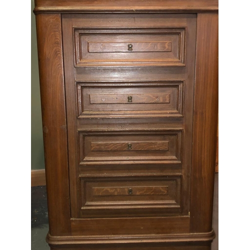 215 - A 20th century solid cast iron bachelor chest of drawers shaped floor safe. The safe in the shape of... 