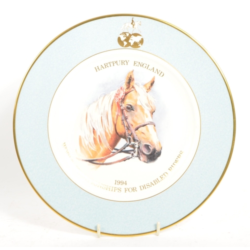 100 - A late 1990s fine bone china disabled horse riders plate by Royal Doulton. Produced in conjunction w... 