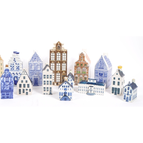 12 - A collection of miniature houses / flasks in blue Delft and other colours, hand painted and made in ... 