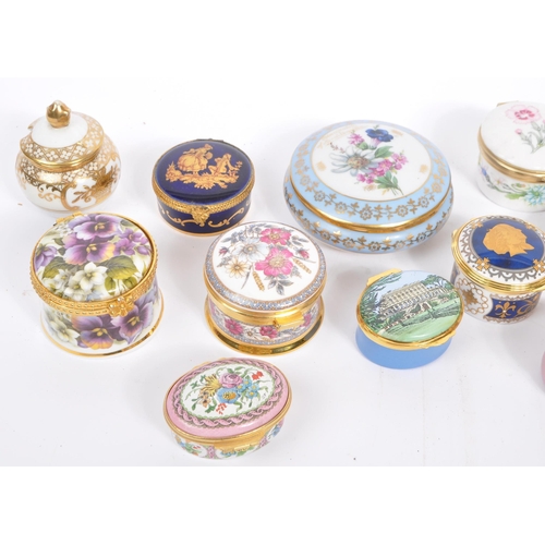 15 - A collection of 14 lidded enamel and porcelain trinket boxes / pots from Halcyon Days, Fenton China ... 