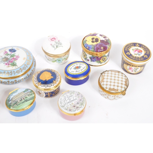 15 - A collection of 14 lidded enamel and porcelain trinket boxes / pots from Halcyon Days, Fenton China ... 