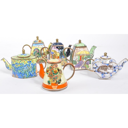 18 - A collection of six ' Trade + Aid ' miniature enamelled brass teapots. These little teapots come in ... 