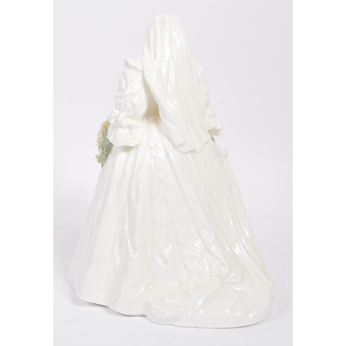 23 - Coalport Diana Princess of Wales - A limited edition Coalport bone china figurine in the form of Pri... 