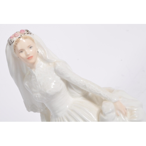 24 - Coalport - The Millennium Bride - A limited edition 20th century Coalport figurine. Sculpted by J Br... 