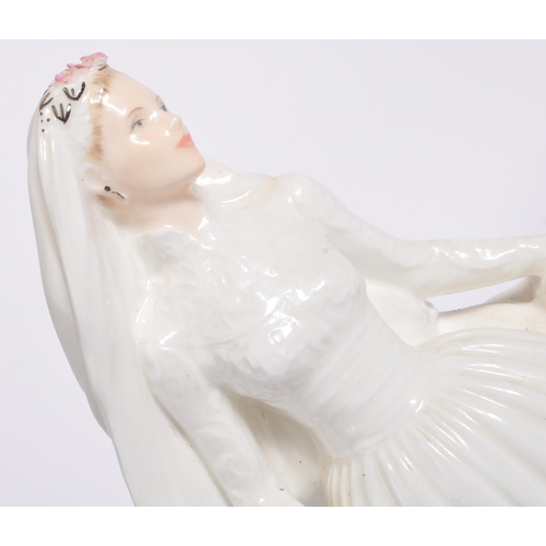 24 - Coalport - The Millennium Bride - A limited edition 20th century Coalport figurine. Sculpted by J Br... 