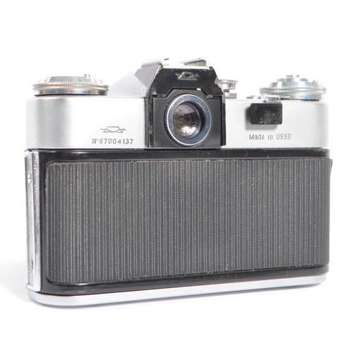 248 - A 20th century 35mm analogue Zenit E SLR camera, alongside two box cameras. The lot to include a Zen... 