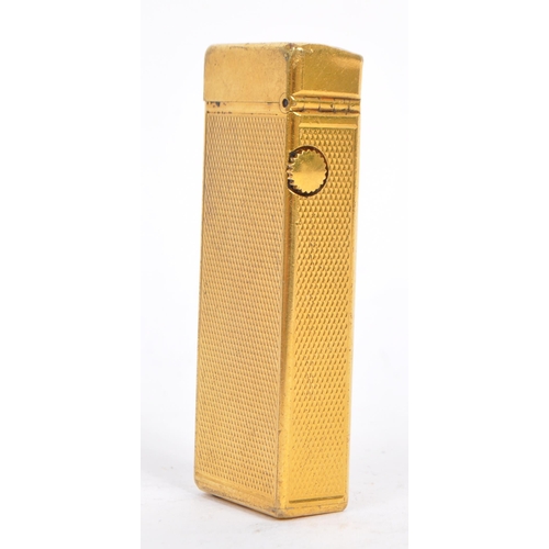 Dunhill A 20th century Dunhill Swiss made gold plated cigarette