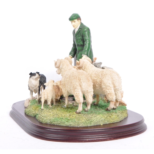 326 - The Leonardo Collection - Two late 20th century figurines. Depicting a farmer with a collie sheep do... 