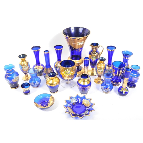 35 - A large collection of Czech Bohemian art glass (20 plus pieces) in cobalt blue, with hand painted / ... 