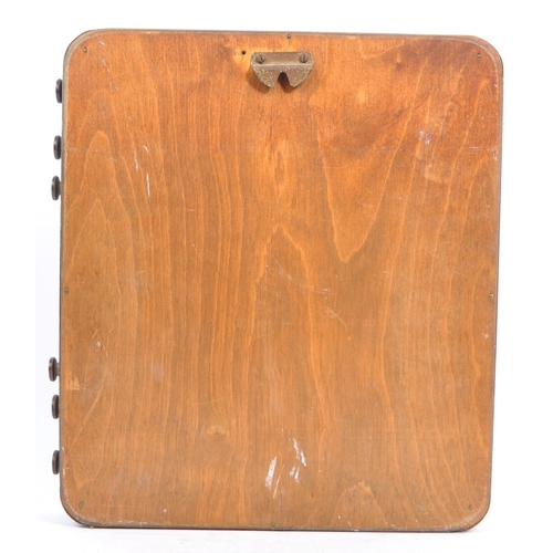 366 - A mid 20th century oak veneer perpetual wall calendar. The calendar being of square form with canvas... 