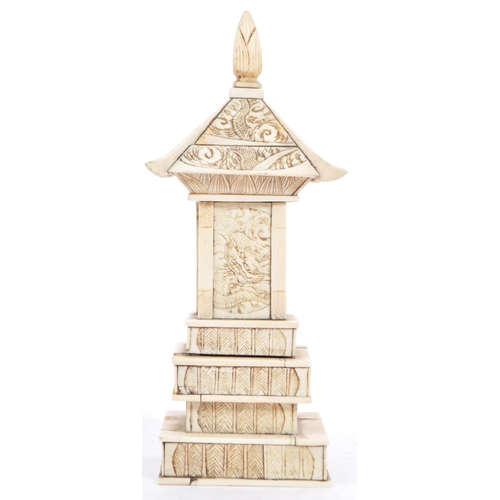 368 - A 19th century Meiji period bone carving of a Pagoda tiered tower. With intricate carved detail of f... 