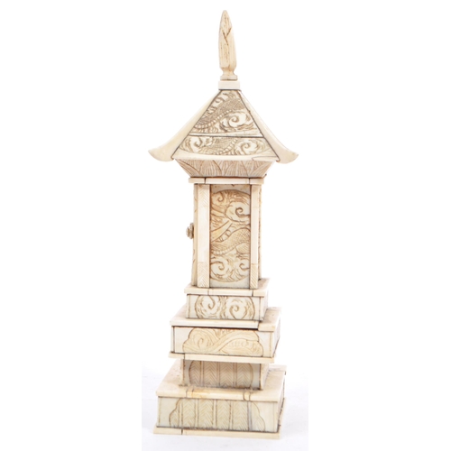 368 - A 19th century Meiji period bone carving of a Pagoda tiered tower. With intricate carved detail of f... 