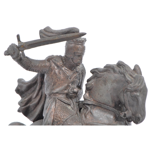 371 - An early 20th century spelter classical knight with sword on rearing horse model / figurine, raised ... 