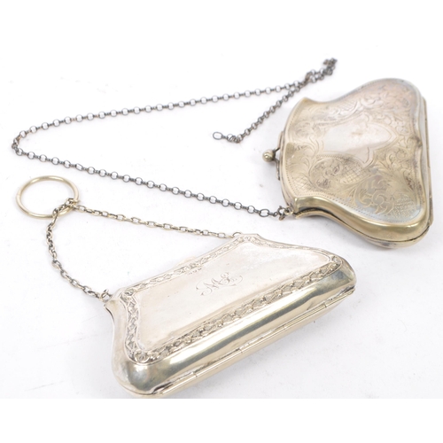 379 - Two silver plated purses. One having an etched scrolled design with central vacant cartouche. The  o... 